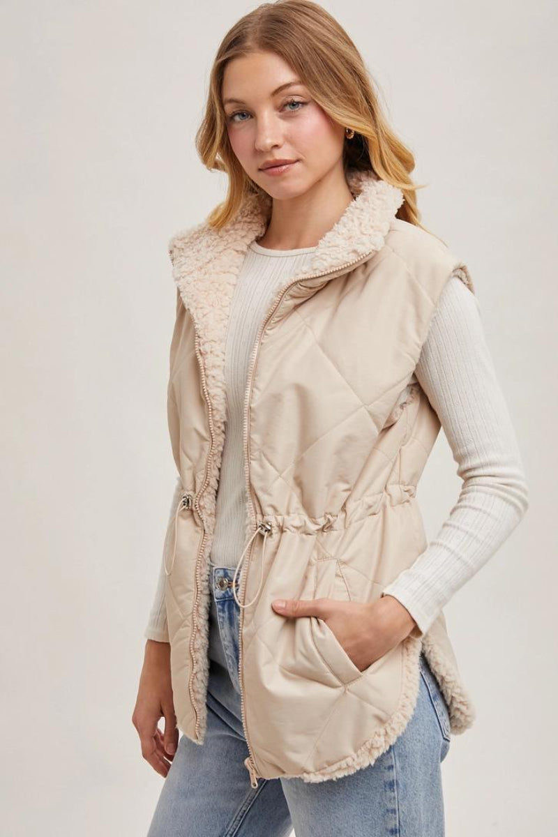 BLUIVY REVERSIBLE PUFFER AND SHERPA VEST - SIDE VIEW