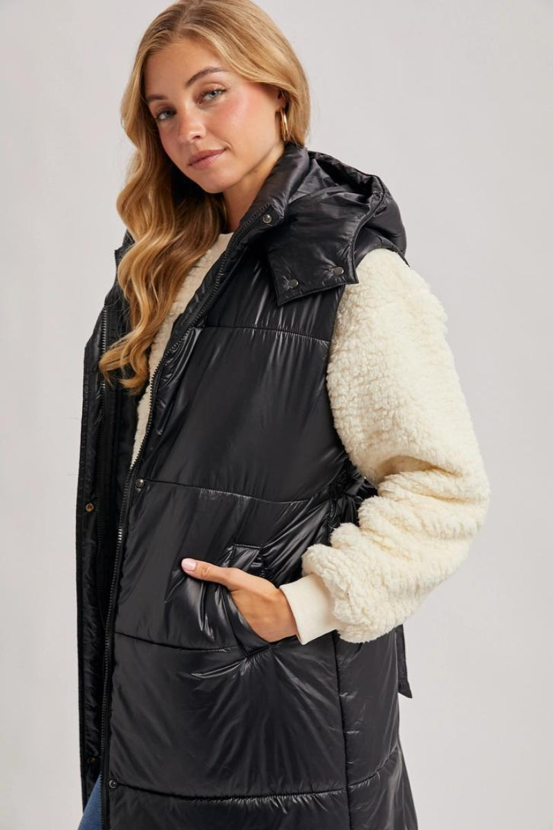 BLUIVY LONG LINE BELT PUFFER HOODED VEST - SIDE VIEW